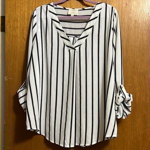 Black and White Stripped 2XL Blouse. Does have stretch and it flows.